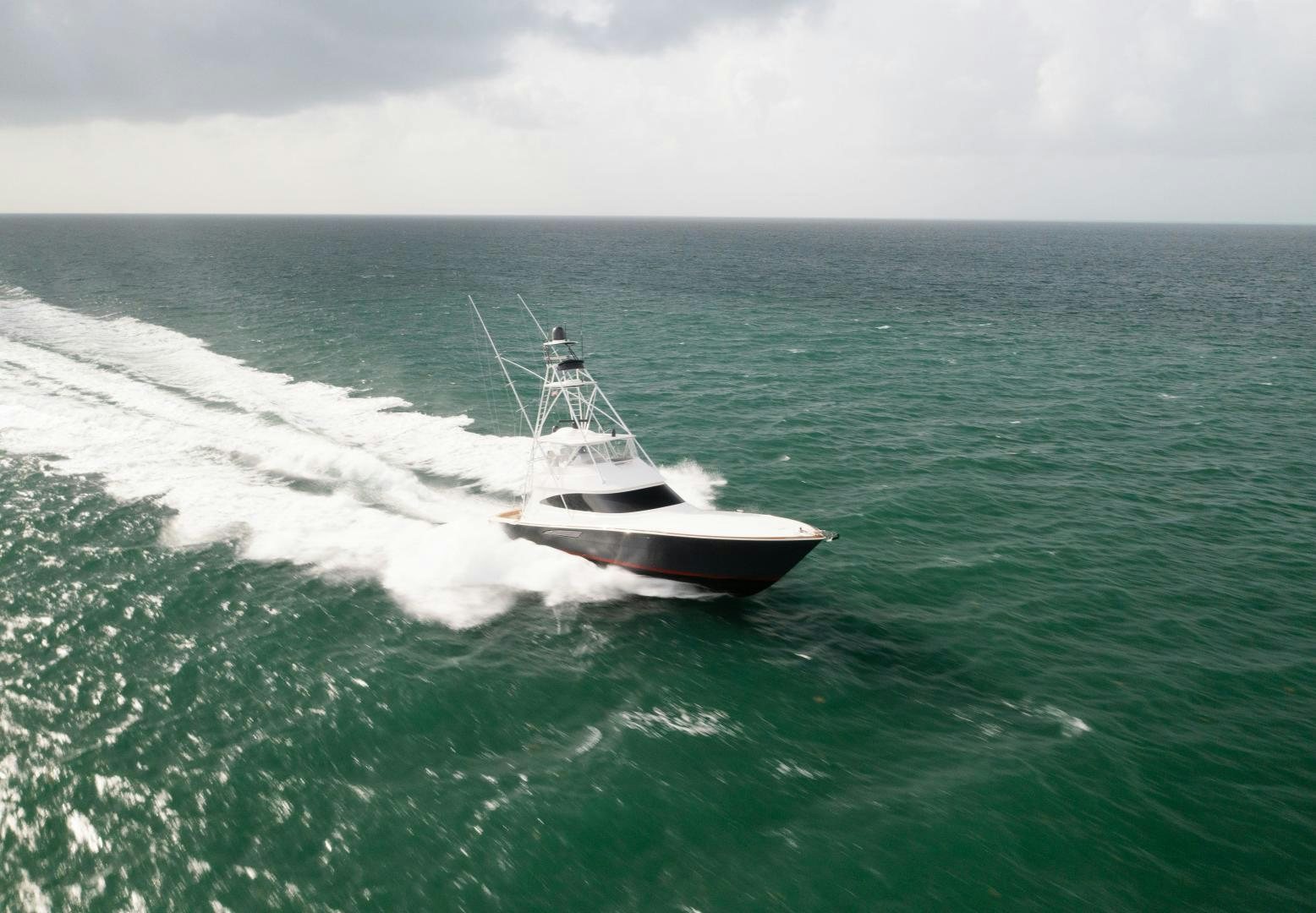 a boat in the ocean aboard DAWG DAZE Yacht for Sale