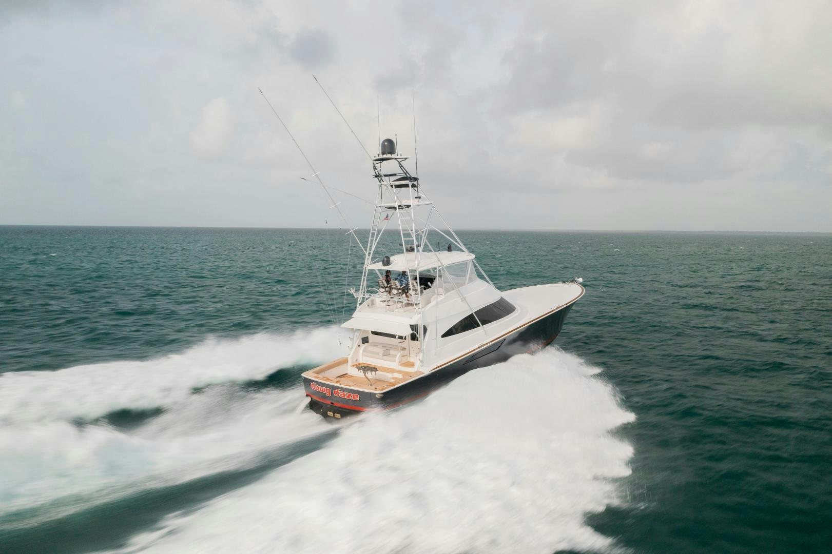 a boat on the water aboard DAWG DAZE Yacht for Sale