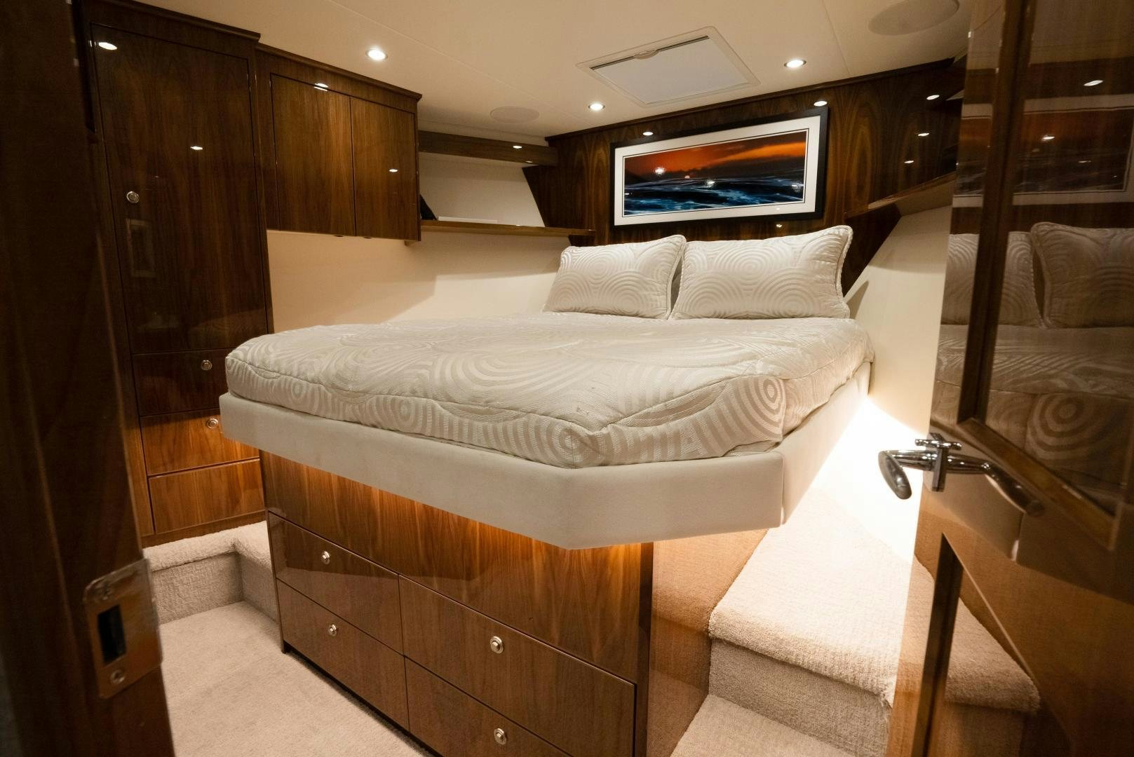 a hotel room with a bed aboard DAWG DAZE Yacht for Sale