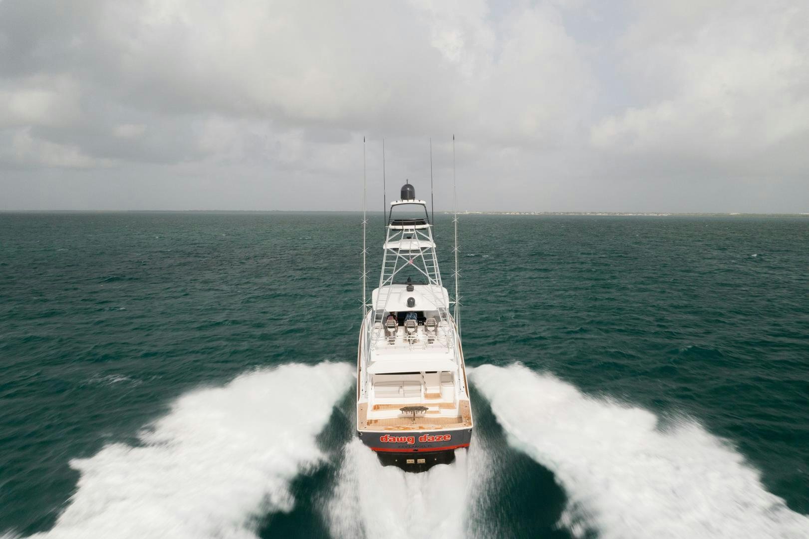 a boat on the water aboard DAWG DAZE Yacht for Sale