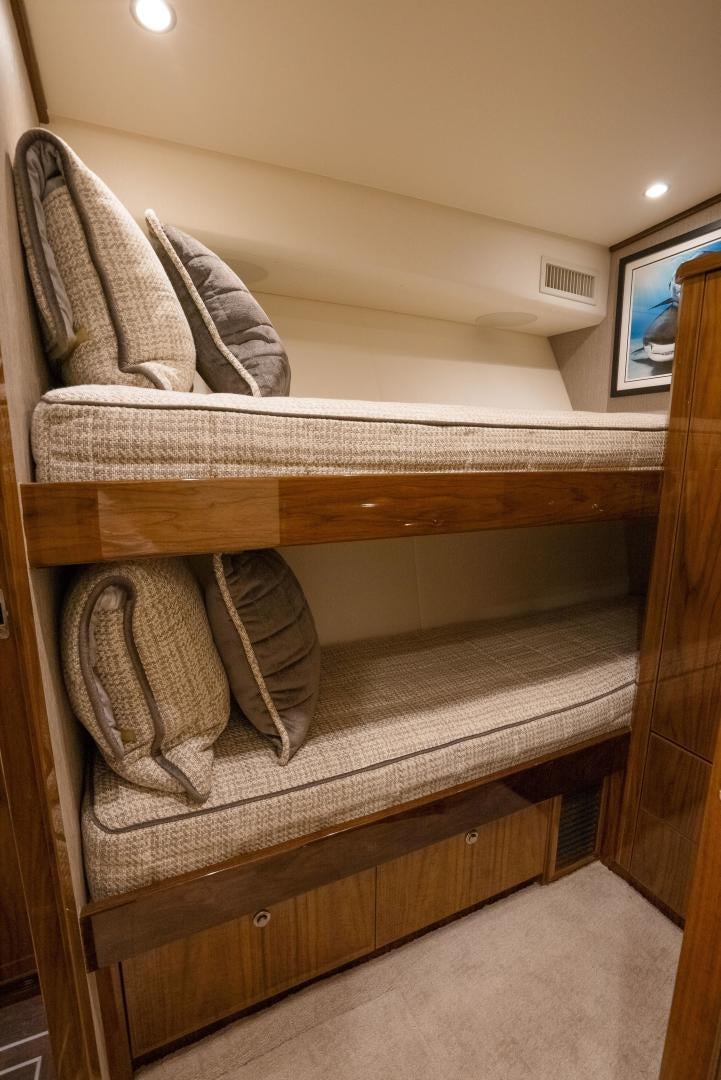 a couch with pillows on it aboard DAWG DAZE Yacht for Sale