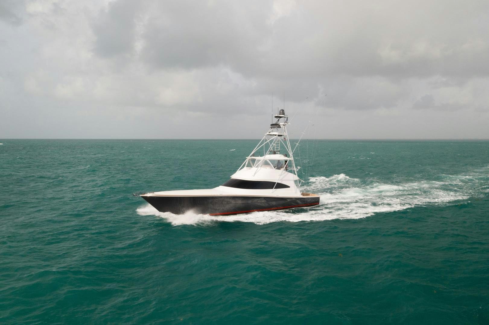 a boat in the ocean aboard DAWG DAZE Yacht for Sale