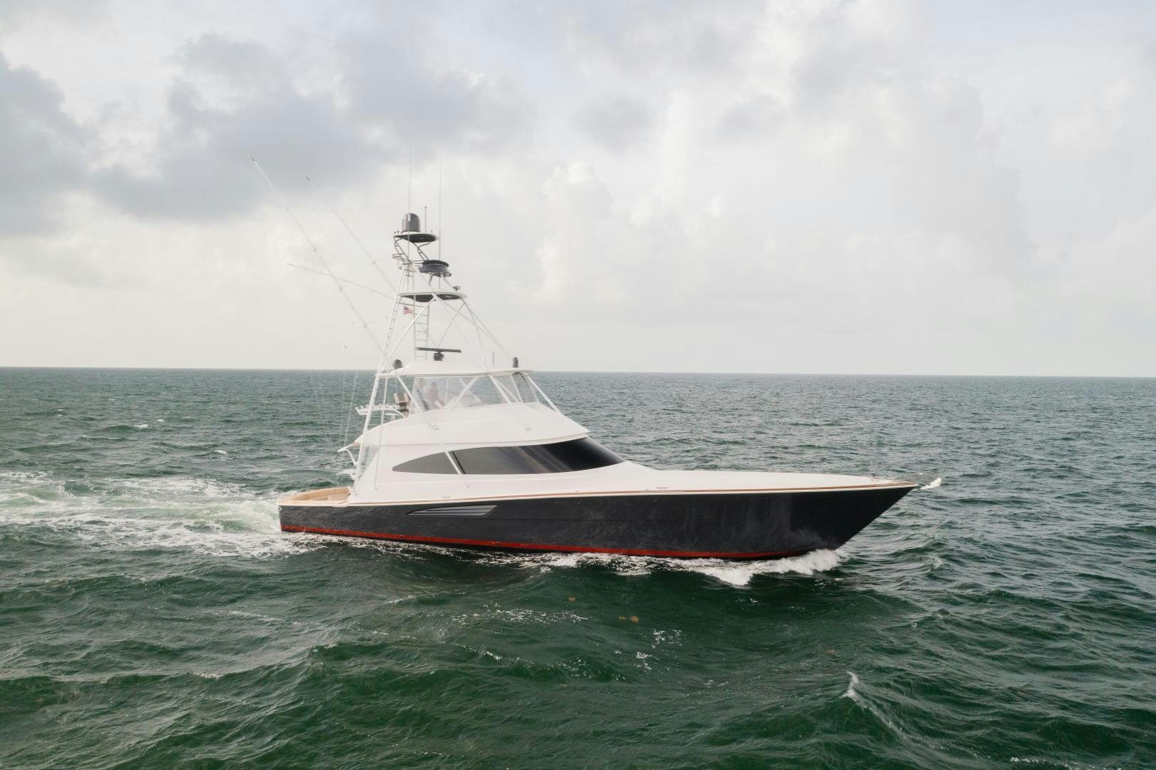 a boat in the ocean aboard DAWG DAZE Yacht for Sale