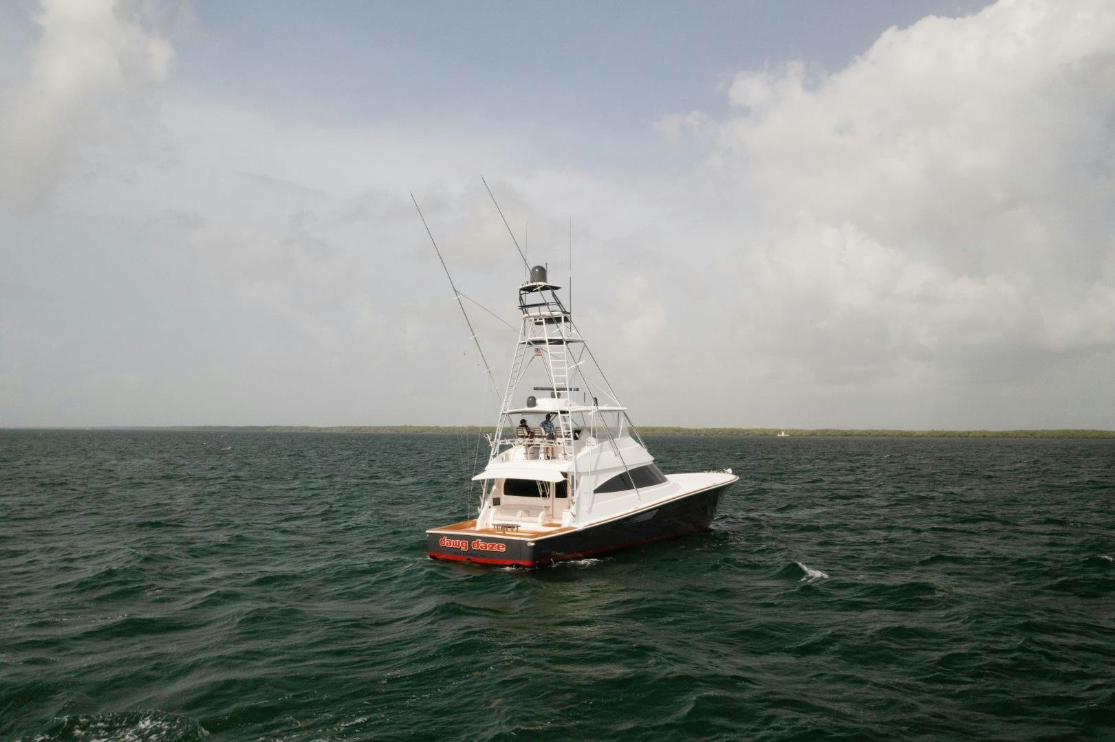 a boat in the water aboard DAWG DAZE Yacht for Sale