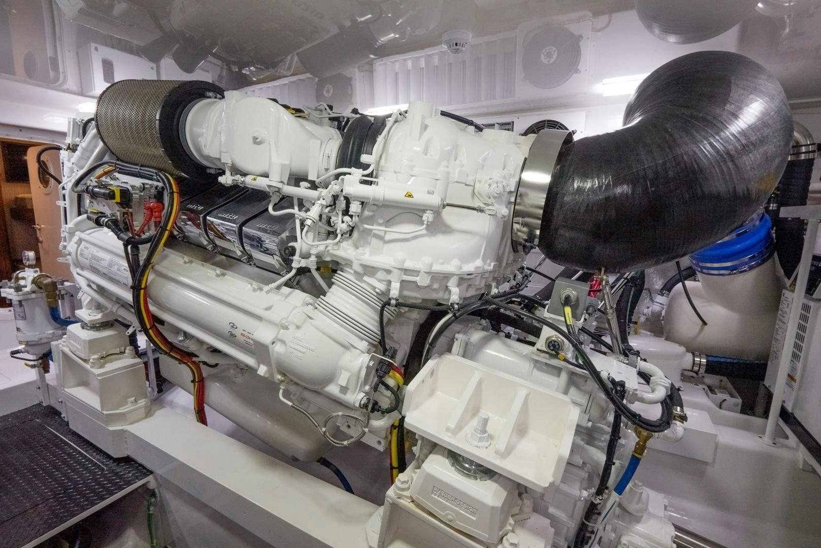 a machine with a large metal pipe aboard DAWG DAZE Yacht for Sale