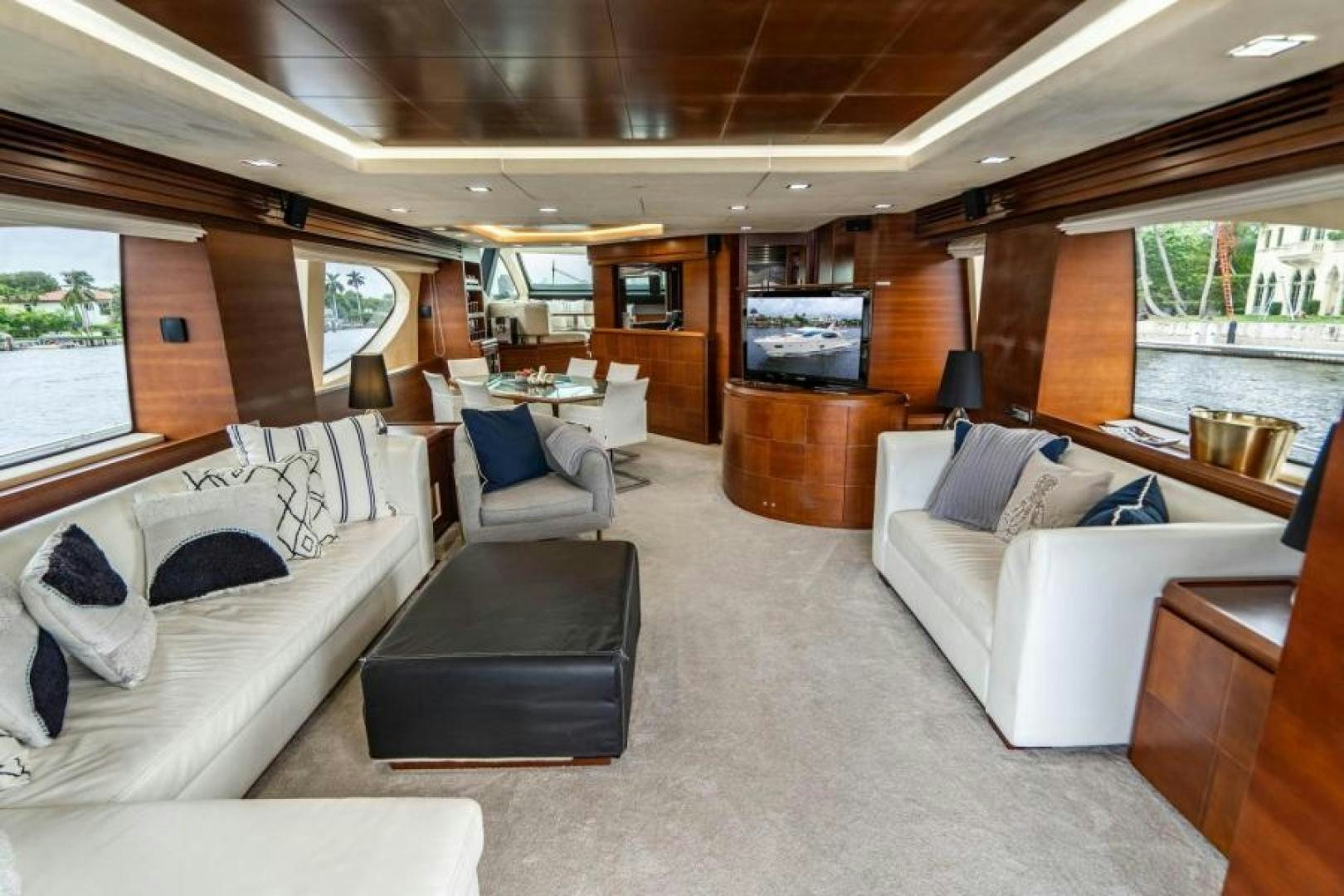 a living room with a couch and a tv aboard KNOT WOKE Yacht for Sale