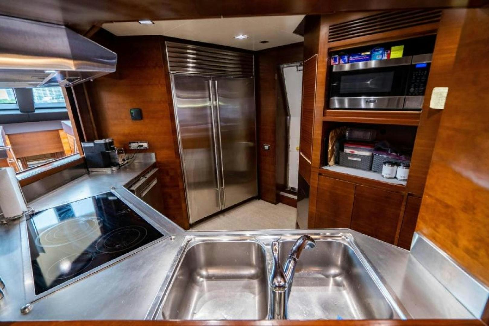 a kitchen with stainless steel appliances aboard KNOT WOKE Yacht for Sale