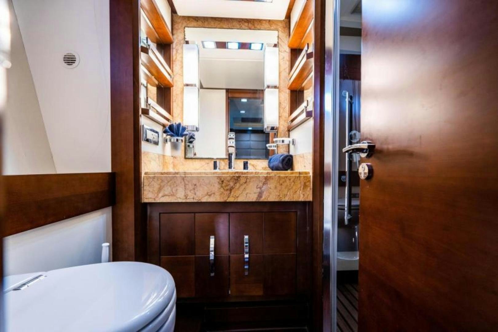 a bathroom with a sink and toilet aboard KNOT WOKE Yacht for Sale