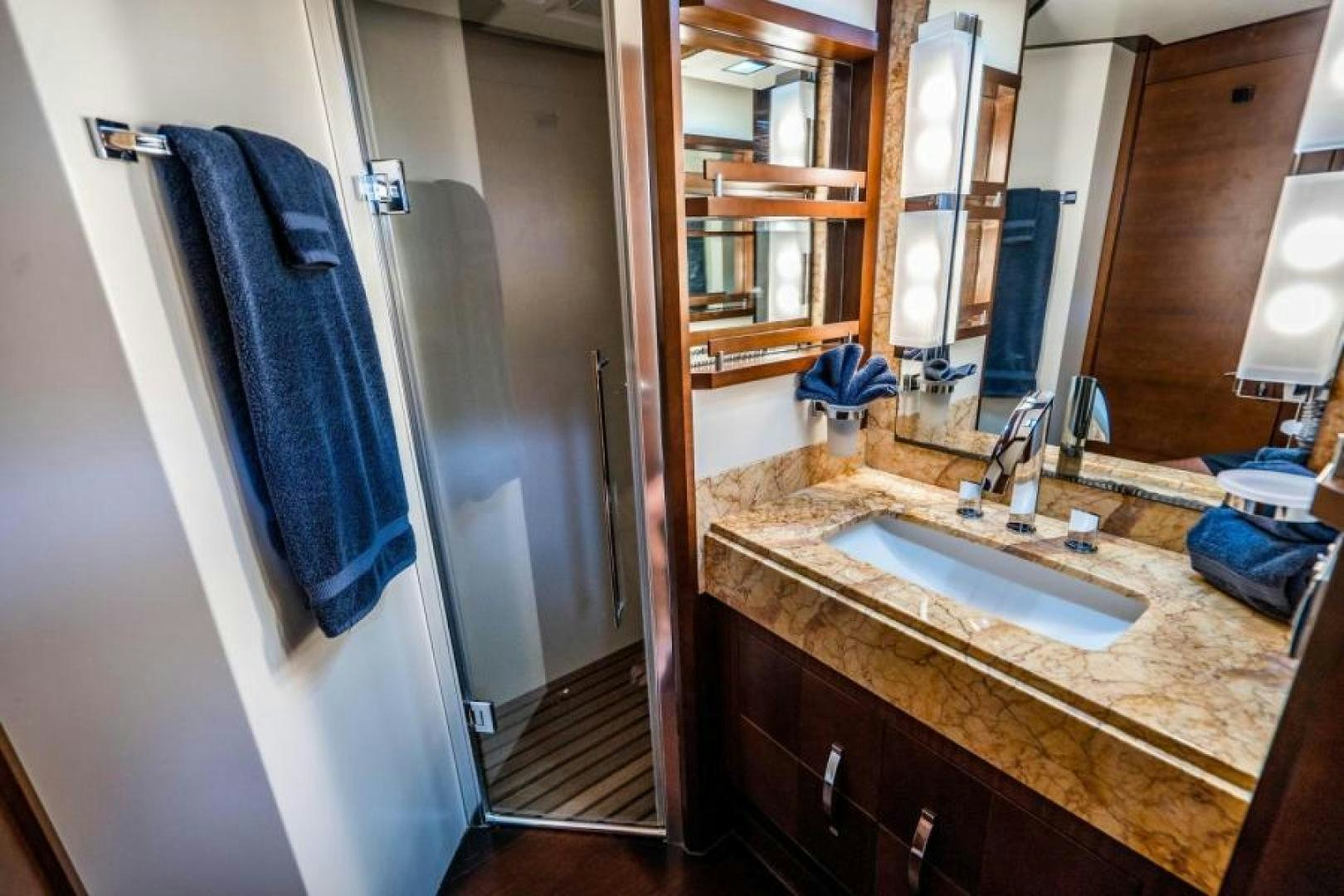 a bathroom with a sink and a mirror aboard KNOT WOKE Yacht for Sale