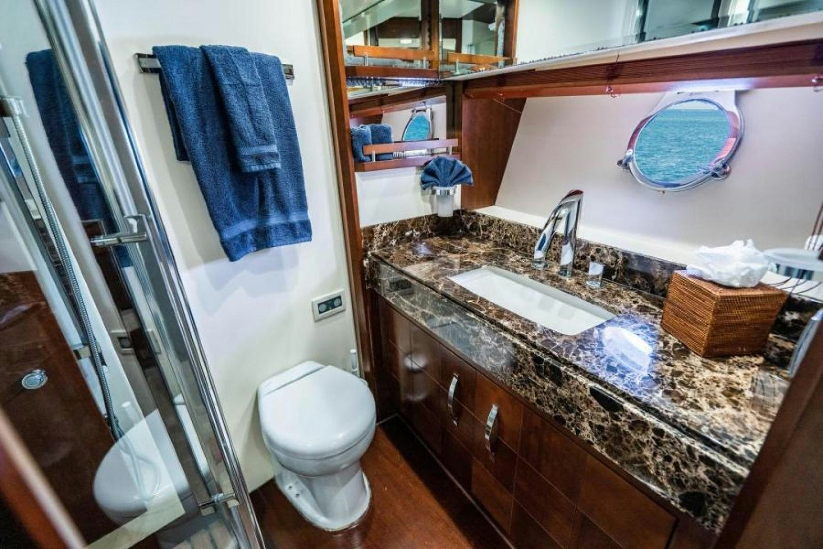 a bathroom with a sink and a toilet aboard KNOT WOKE Yacht for Sale