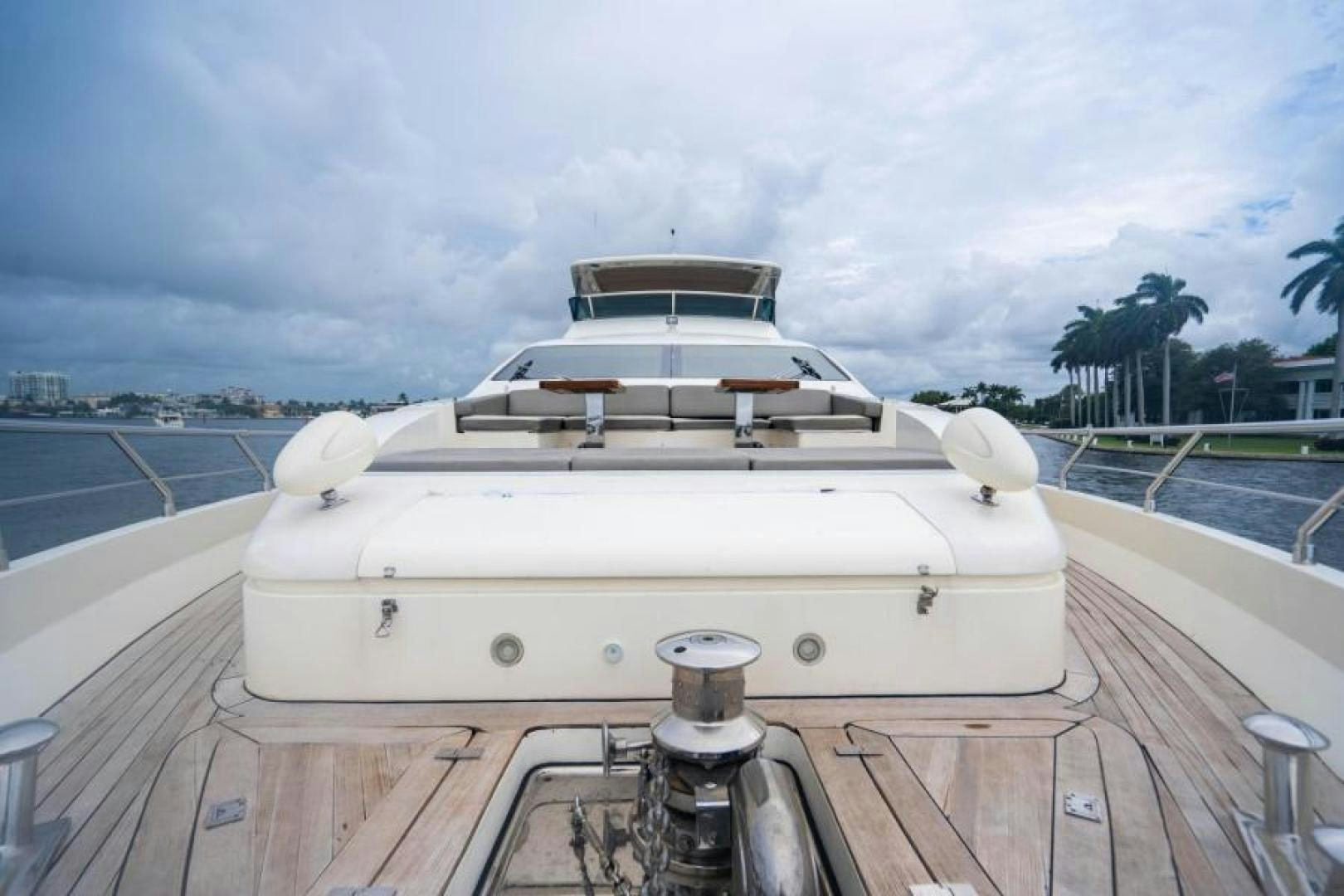 a white boat on a deck aboard KNOT WOKE Yacht for Sale