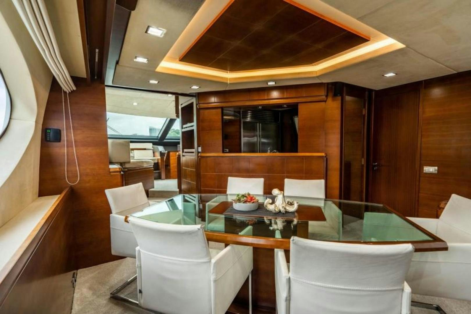 a room with a table and chairs aboard KNOT WOKE Yacht for Sale
