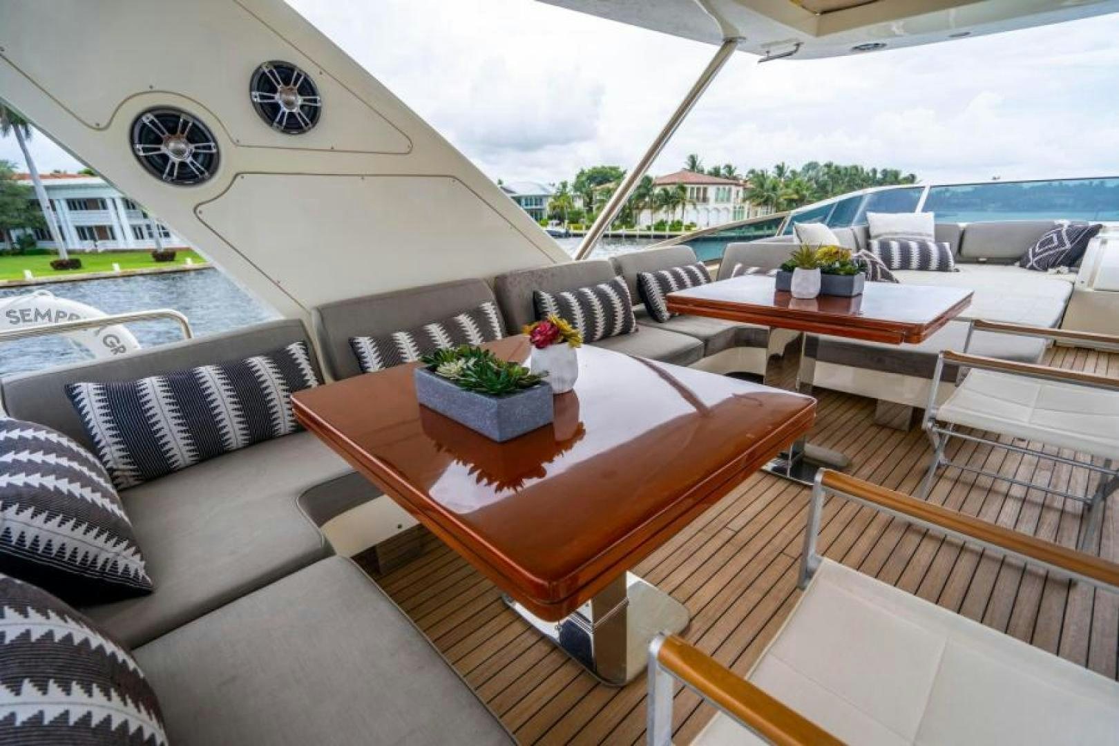 a table and chairs outside aboard KNOT WOKE Yacht for Sale