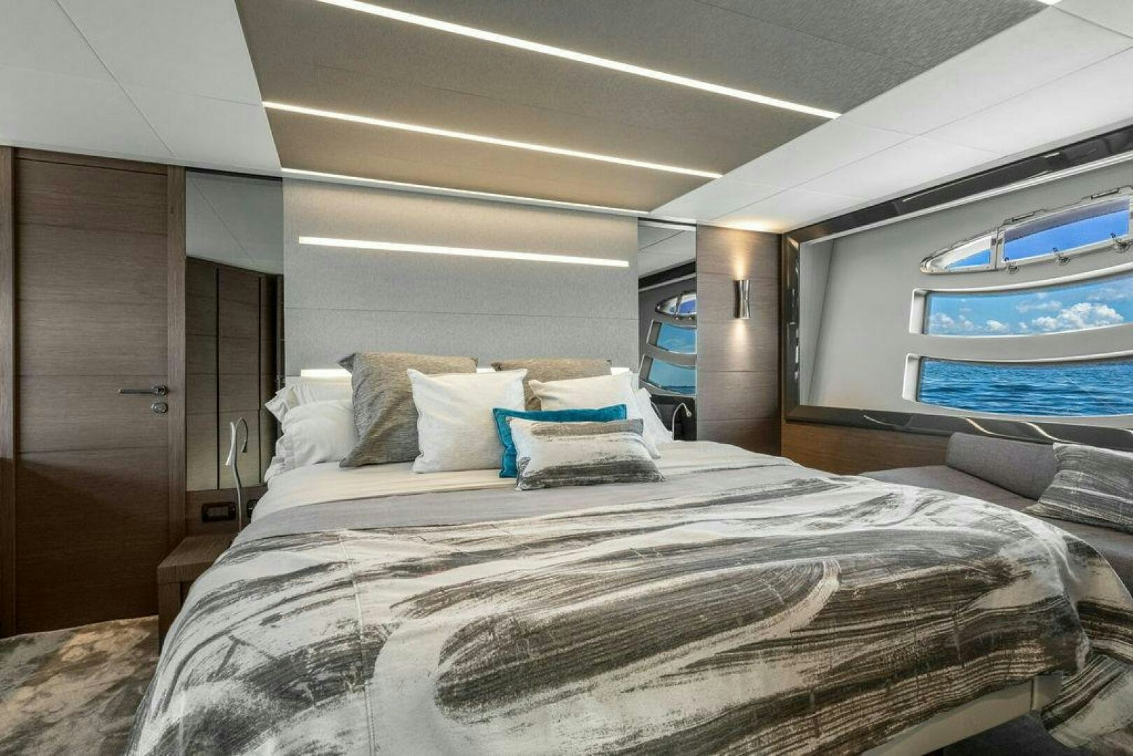 a bed with a large bed aboard VIDI Yacht for Sale
