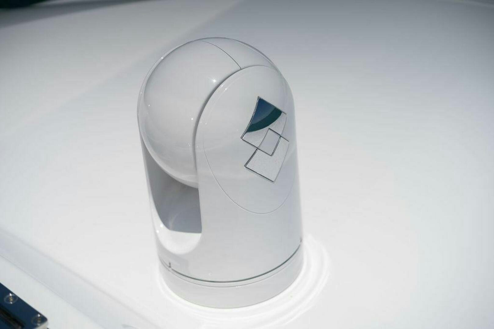a white object with a logo on it aboard VIDI Yacht for Sale