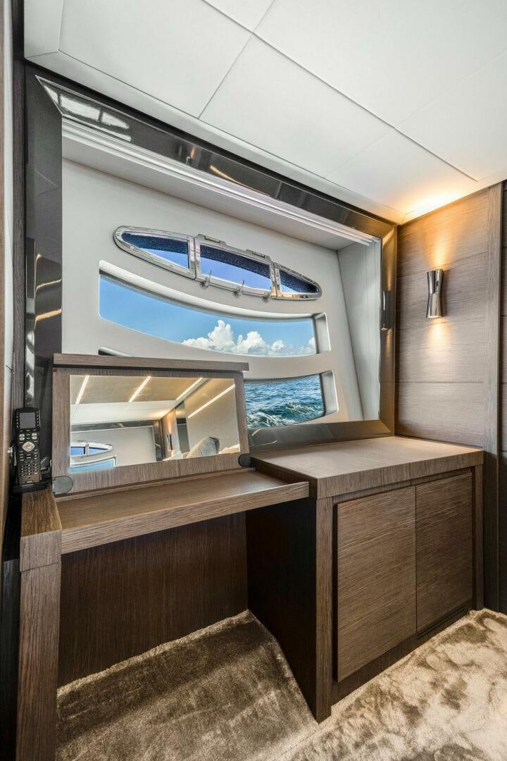 a microwave oven on a shelf aboard VIDI Yacht for Sale