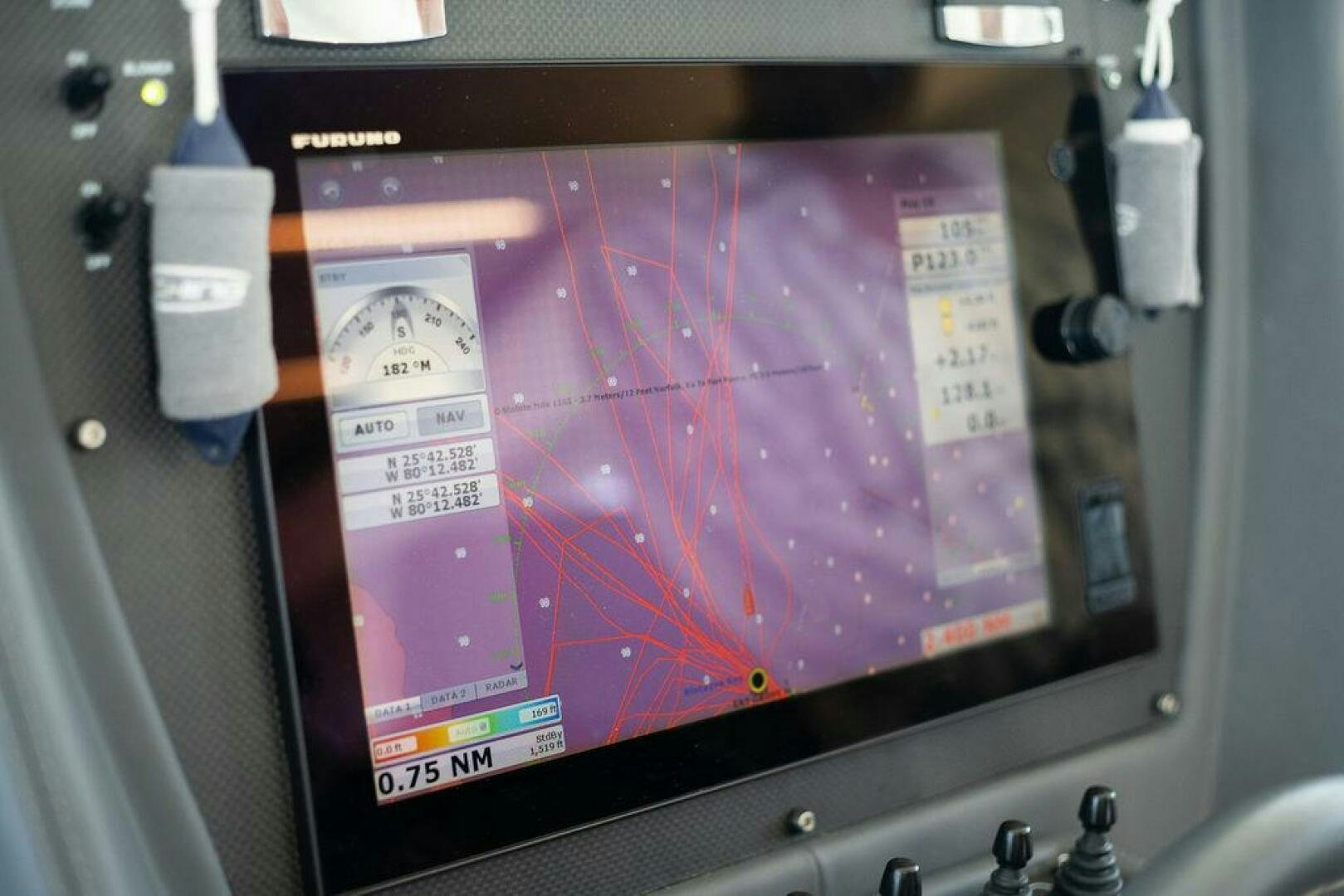 a rectangular electronic device aboard VIDI Yacht for Sale