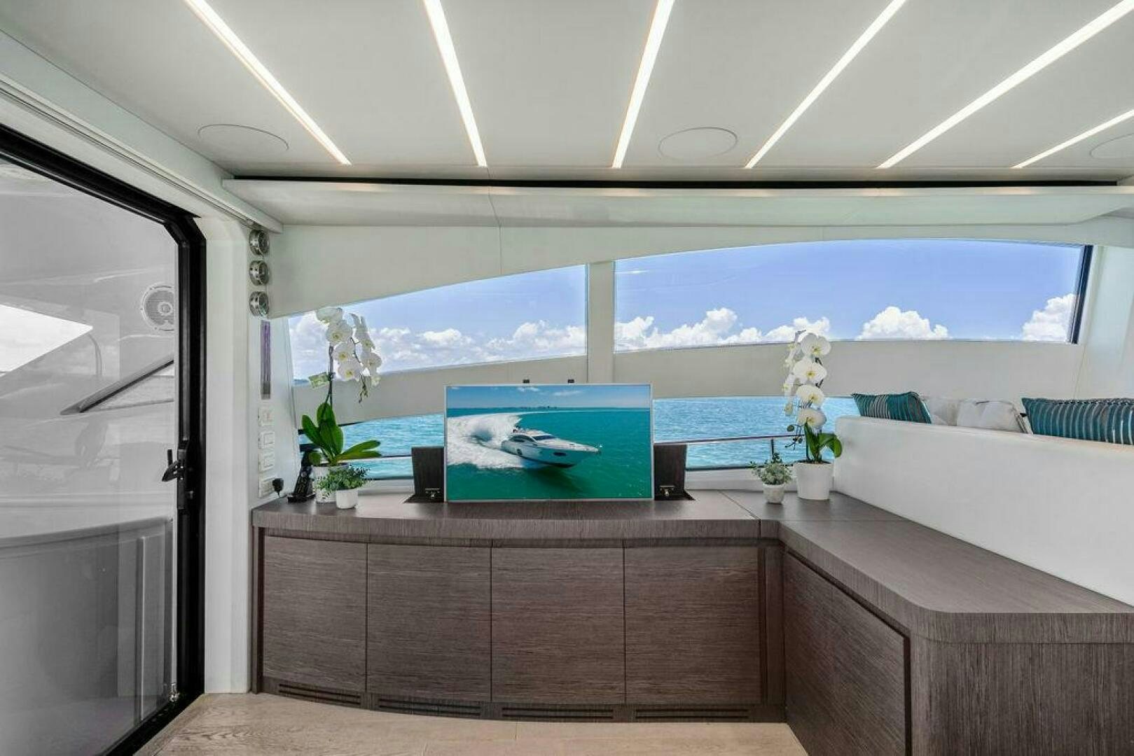 a room with a large window aboard VIDI Yacht for Sale