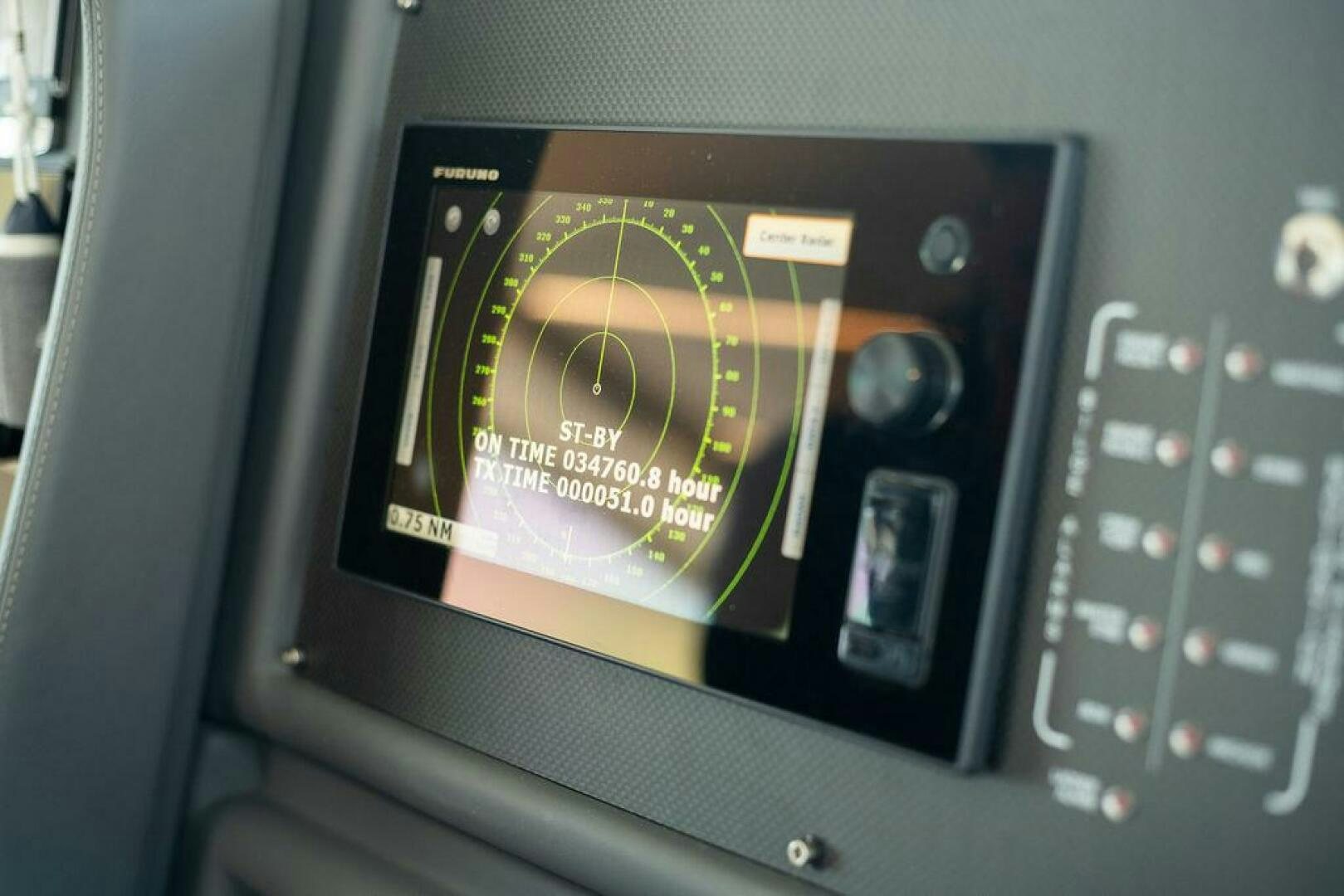 a rectangular electronic device aboard VIDI Yacht for Sale