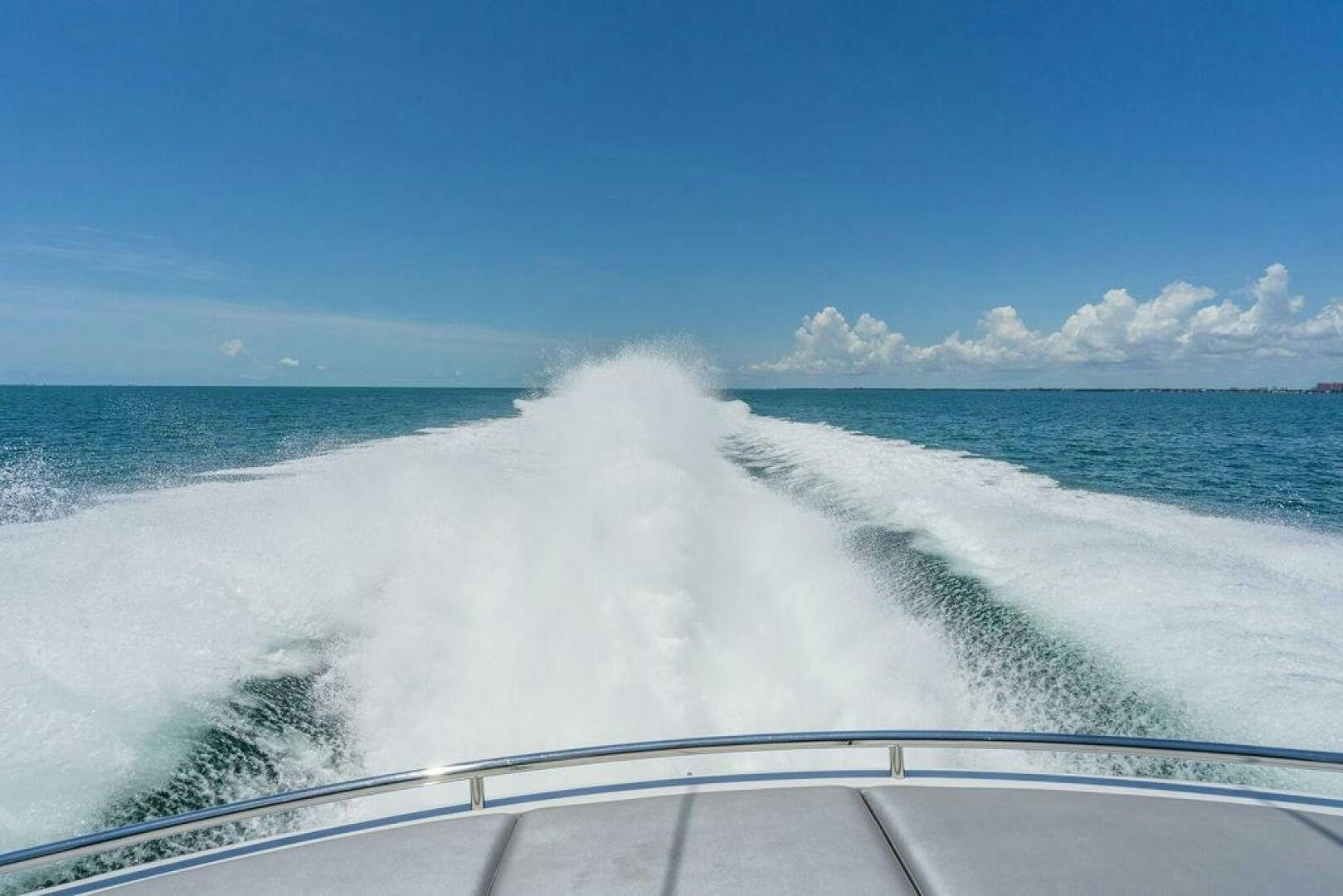 a large wave crashing aboard VIDI Yacht for Sale