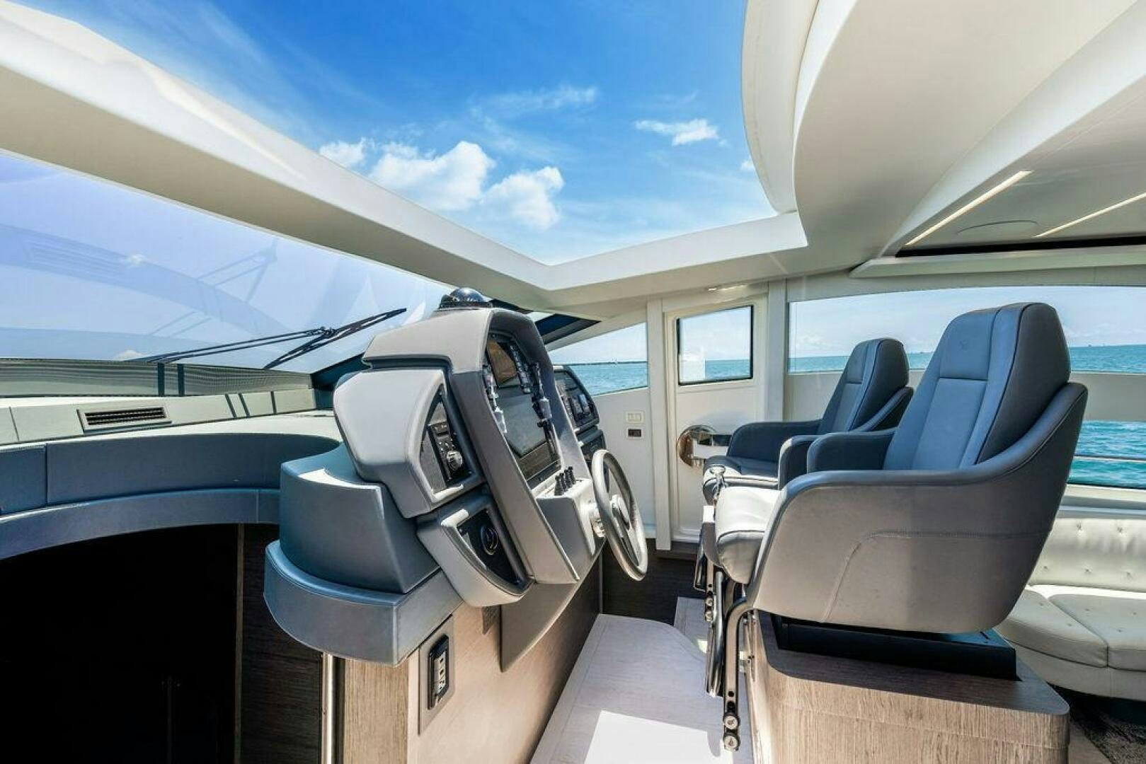 inside of a car aboard VIDI Yacht for Sale