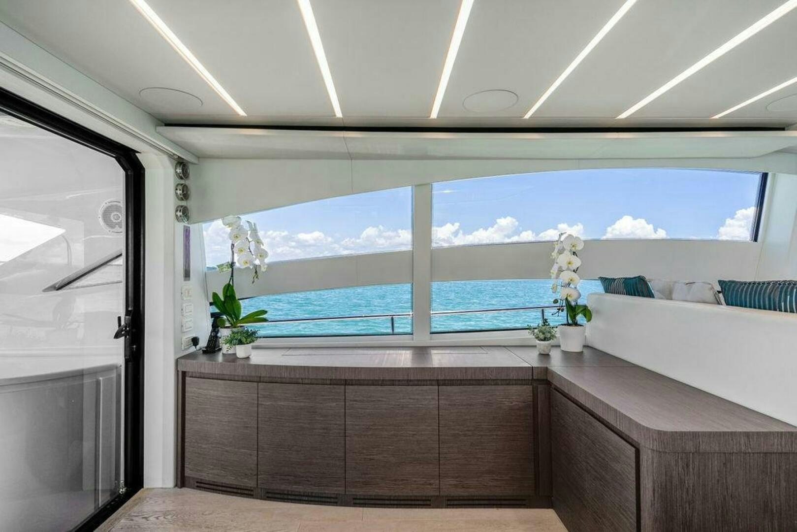 a room with a large window aboard VIDI Yacht for Sale