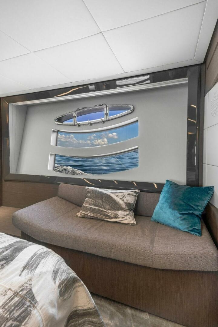 a tv on a wall aboard VIDI Yacht for Sale