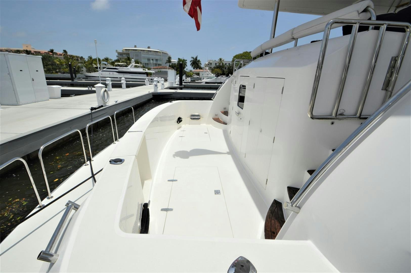 a group of white boats on a beach aboard GRACE Yacht for Sale