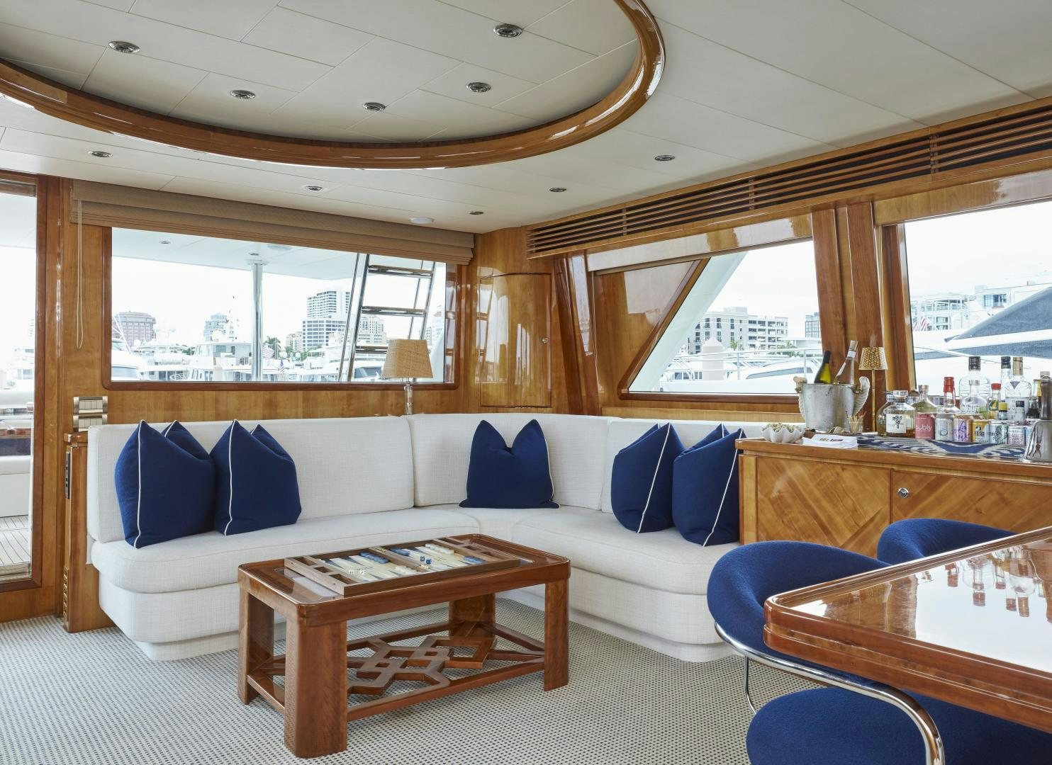 a living room with a couch and a table aboard GRACE Yacht for Sale