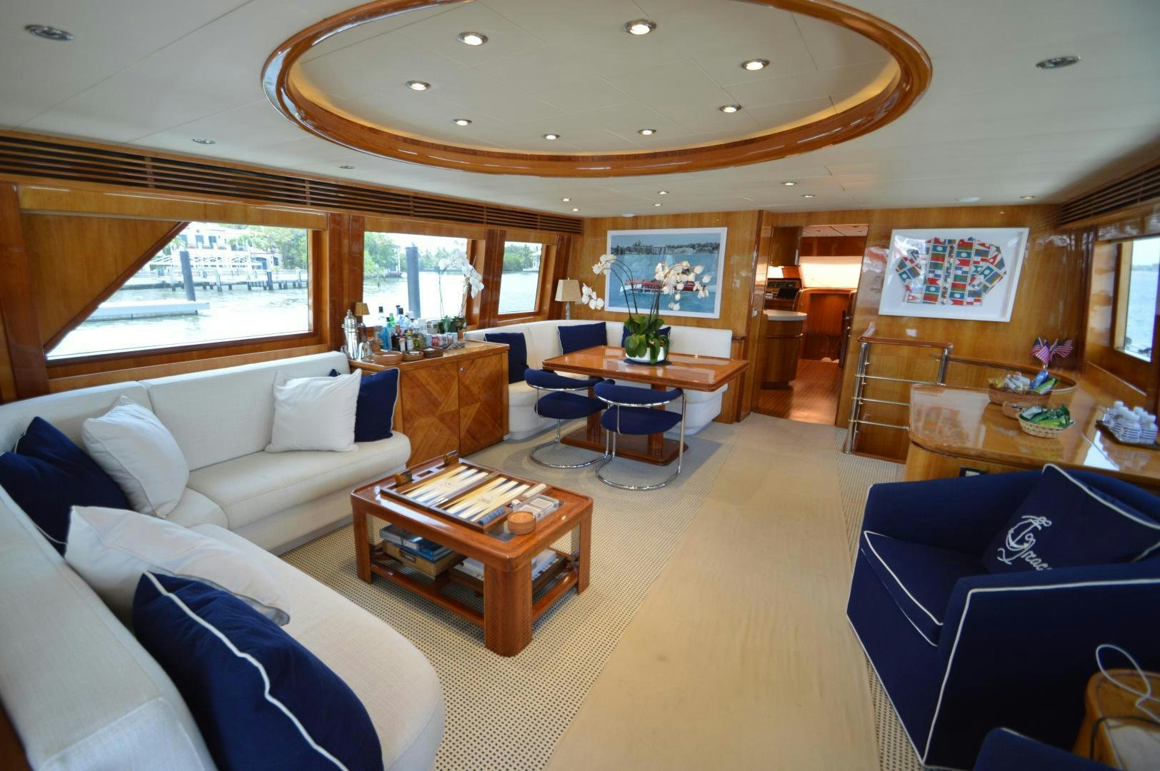 a living room with a large open window aboard GRACE Yacht for Sale