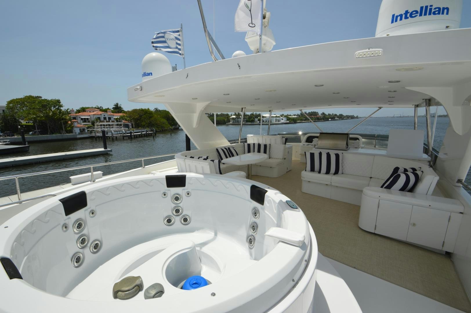 a white yacht docked aboard GRACE Yacht for Sale