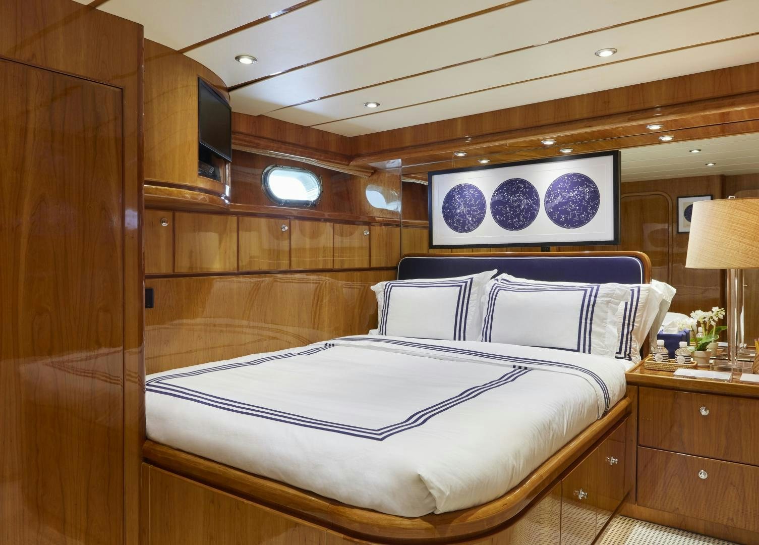 a bed in a room aboard GRACE Yacht for Sale