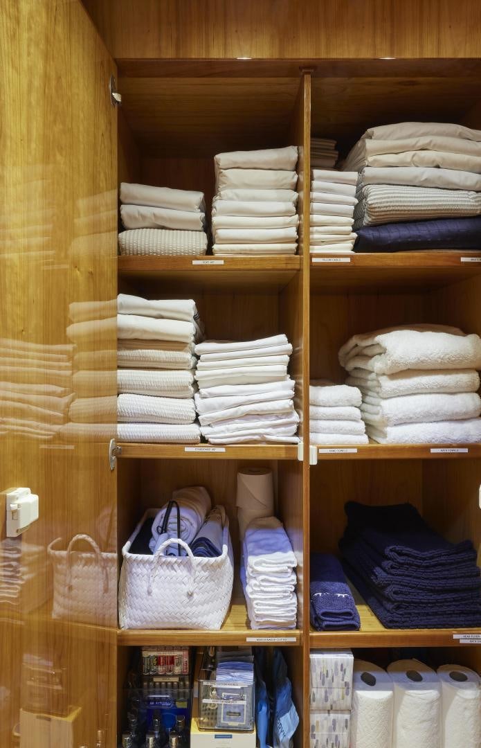 a closet full of clothes aboard GRACE Yacht for Sale