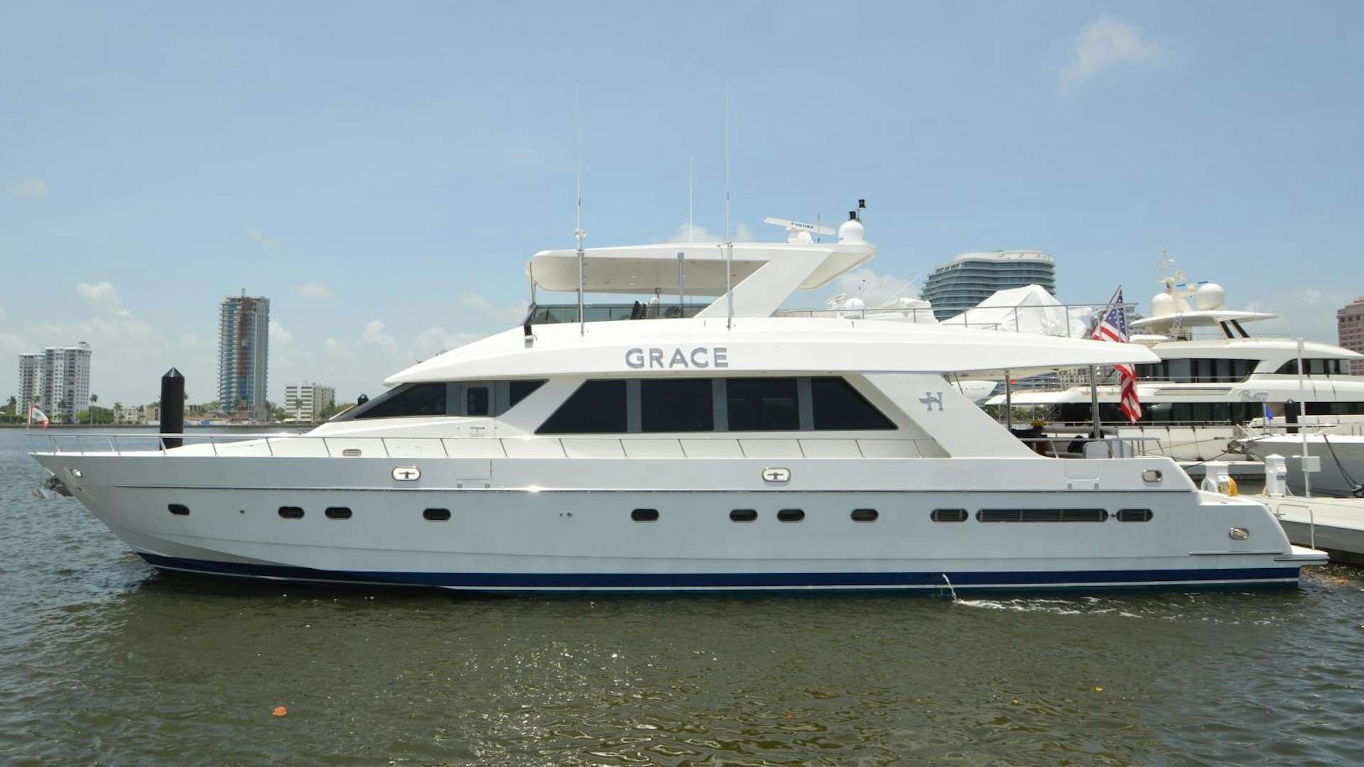 a large white boat aboard GRACE Yacht for Sale