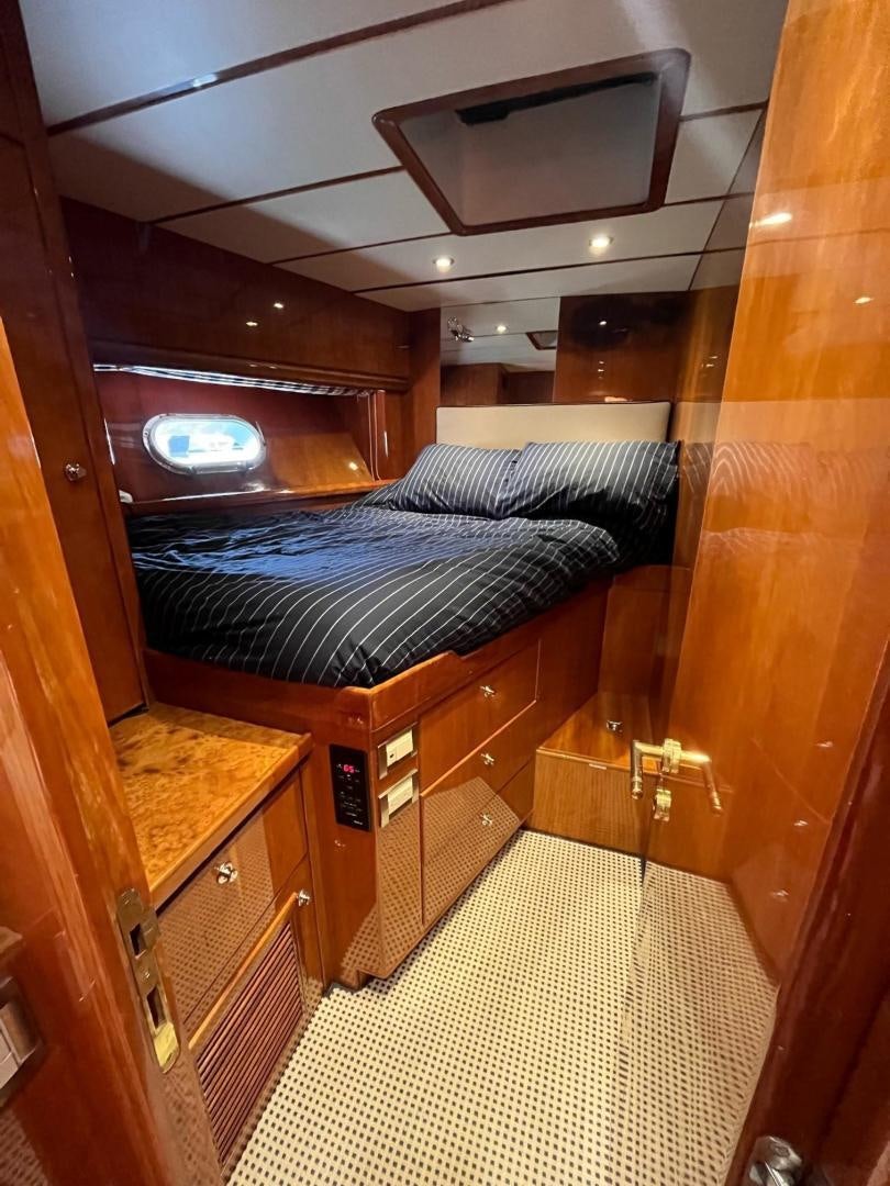 a bed in a room aboard GRACE Yacht for Sale
