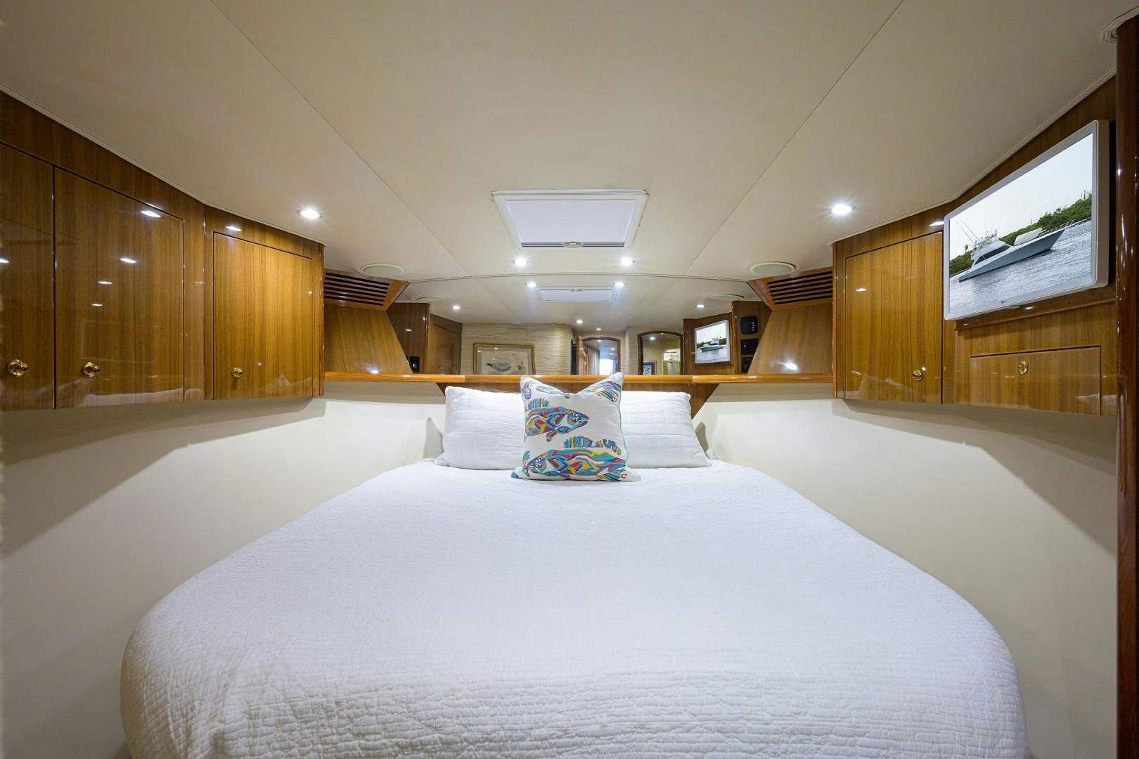 a large bed in a room aboard LA LADY Yacht for Sale