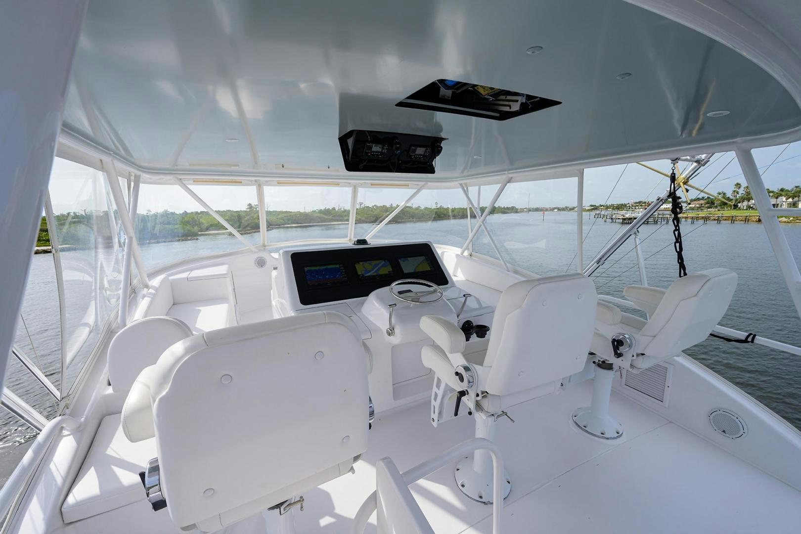 a group of white chairs on a boat aboard LA LADY Yacht for Sale