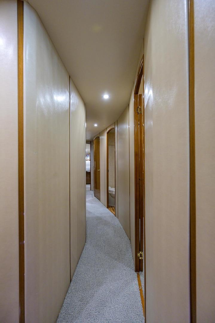 a hallway with a long hallway aboard LA LADY Yacht for Sale
