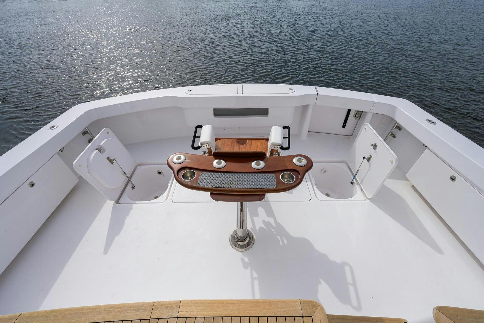 a wooden boat on a body of water aboard LA LADY Yacht for Sale