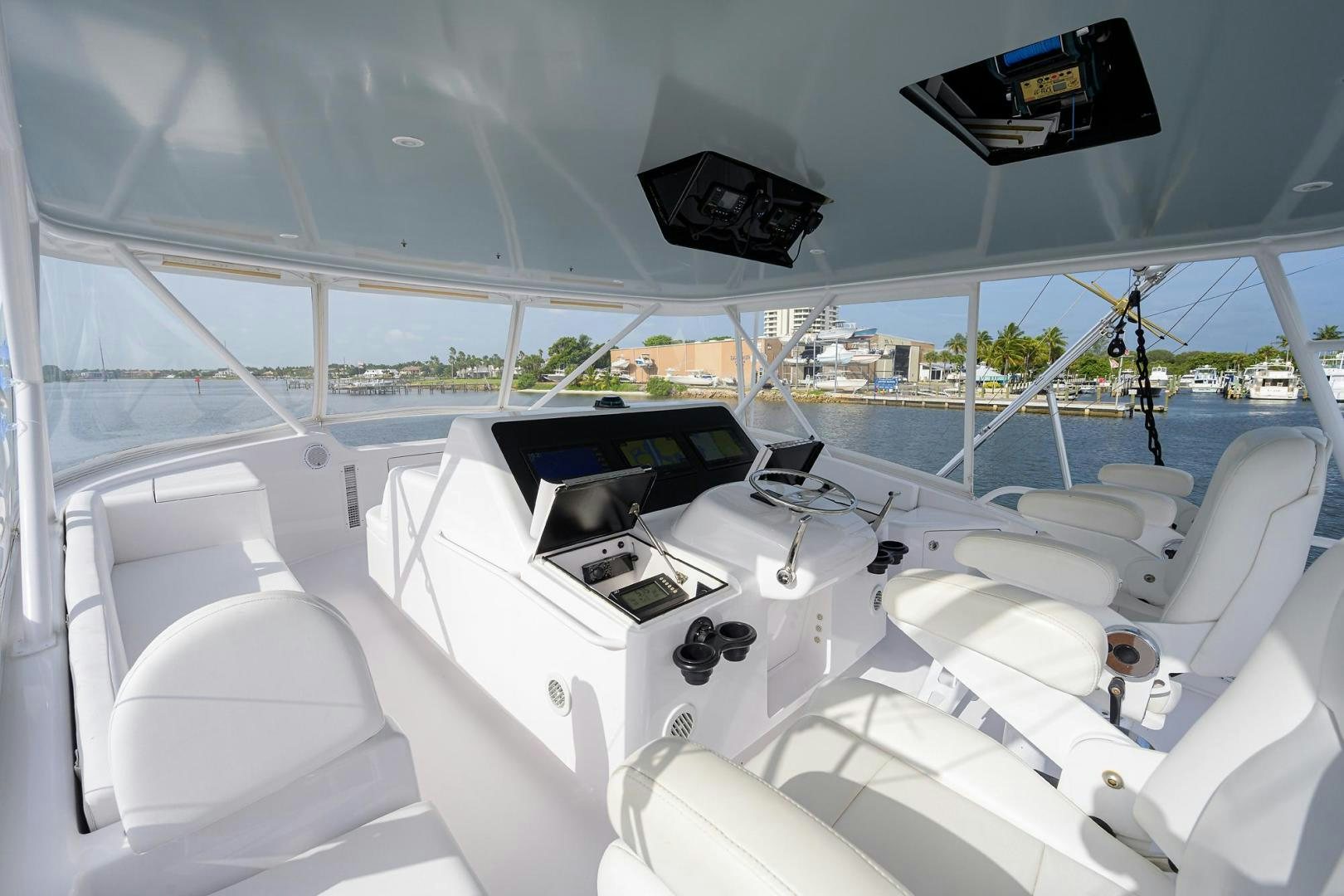 inside of a white car aboard LA LADY Yacht for Sale