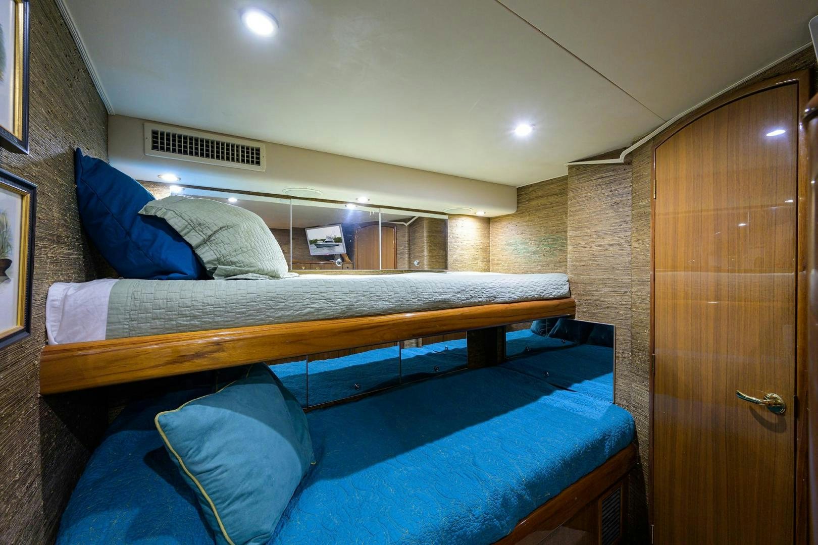 a bed in a room aboard LA LADY Yacht for Sale