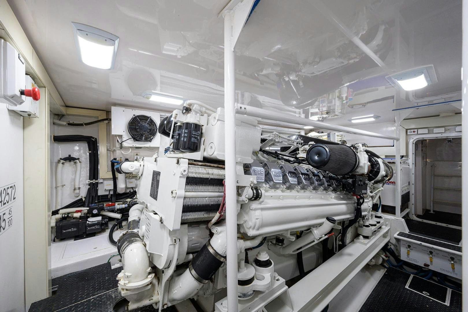 a large white machine in a room aboard LA LADY Yacht for Sale