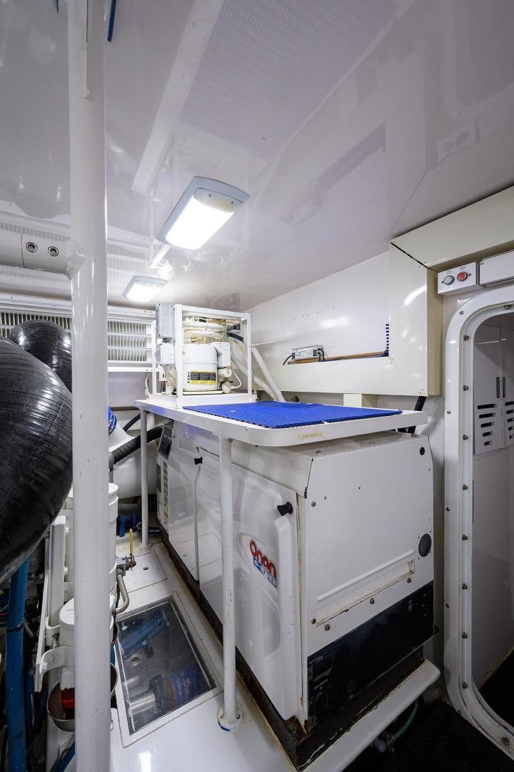 a room with a machine aboard LA LADY Yacht for Sale