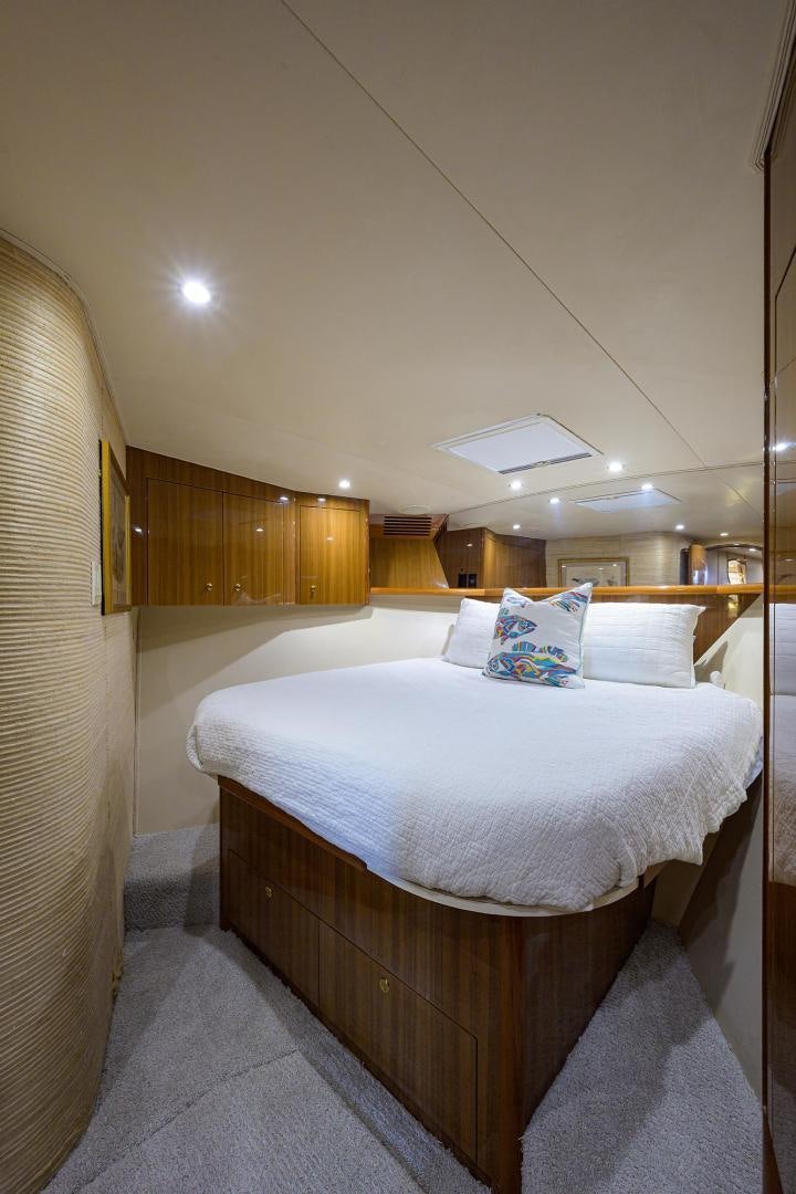 a bed in a room aboard LA LADY Yacht for Sale