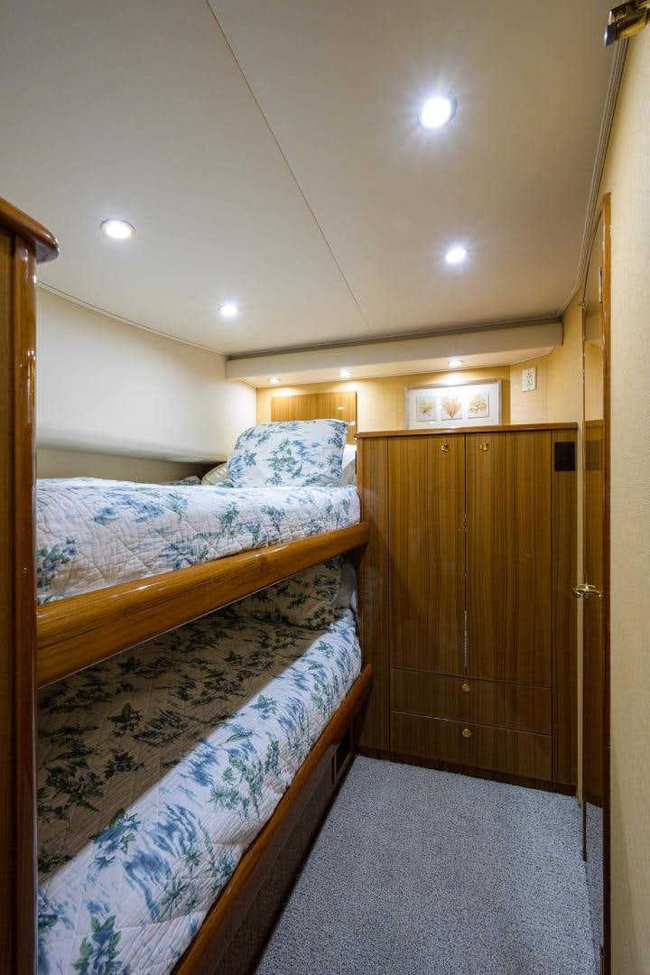 a couple of beds in a room aboard LA LADY Yacht for Sale