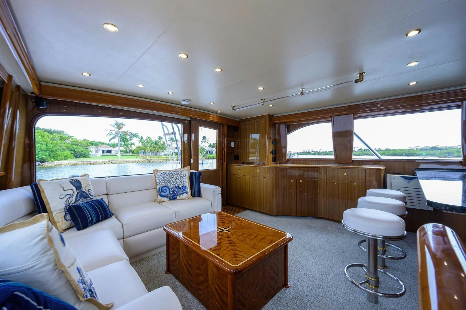 a living room with a couch and a table aboard LA LADY Yacht for Sale