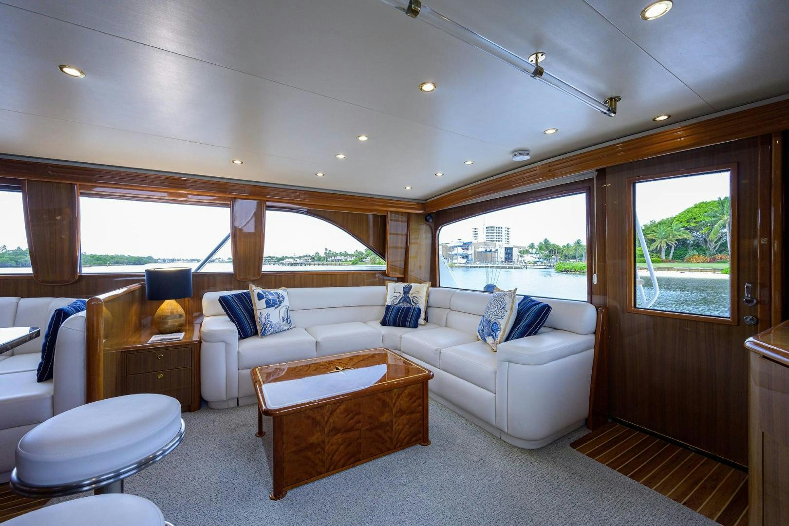 a living room with a couch and a table aboard LA LADY Yacht for Sale