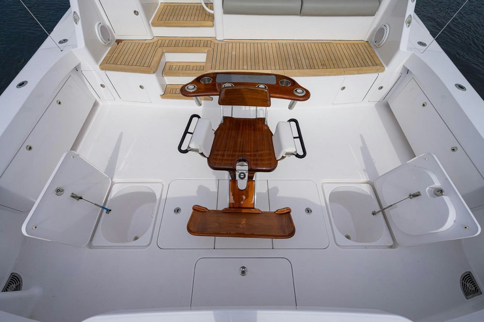 a wooden toy on a white surface aboard LA LADY Yacht for Sale