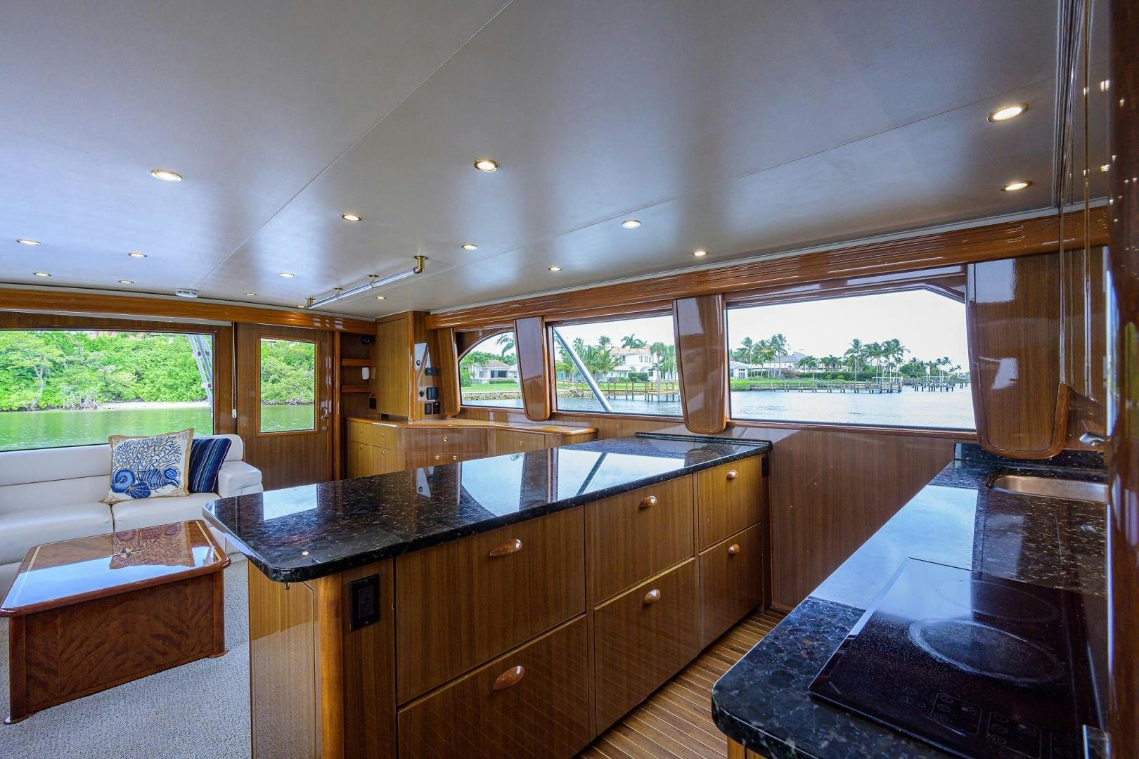 a kitchen with a large island aboard LA LADY Yacht for Sale