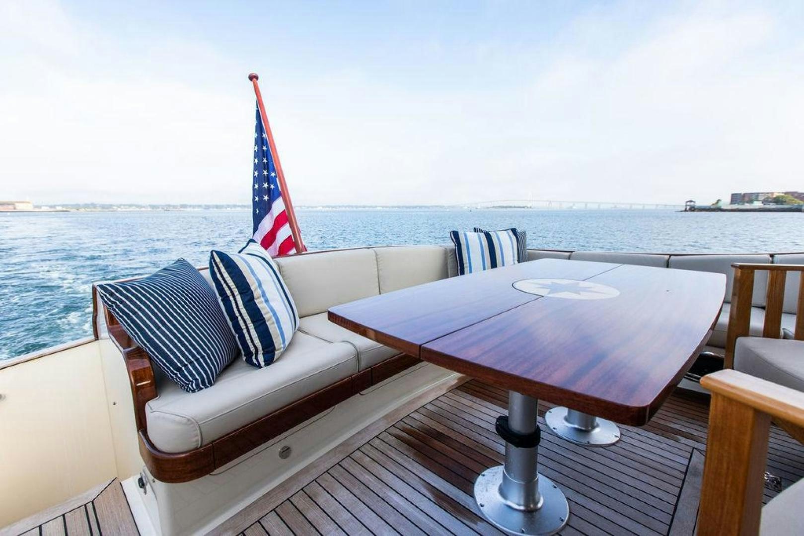 a table with a flag on it aboard JESSICA Yacht for Sale